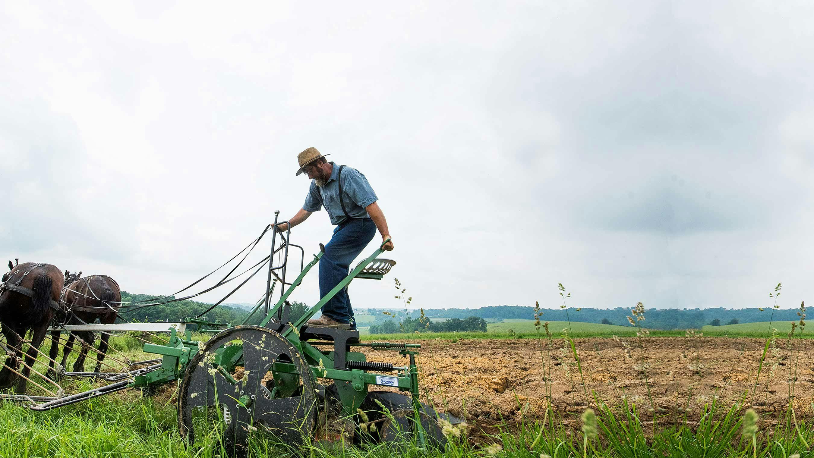 An Organic Valley farmer tending to his fields