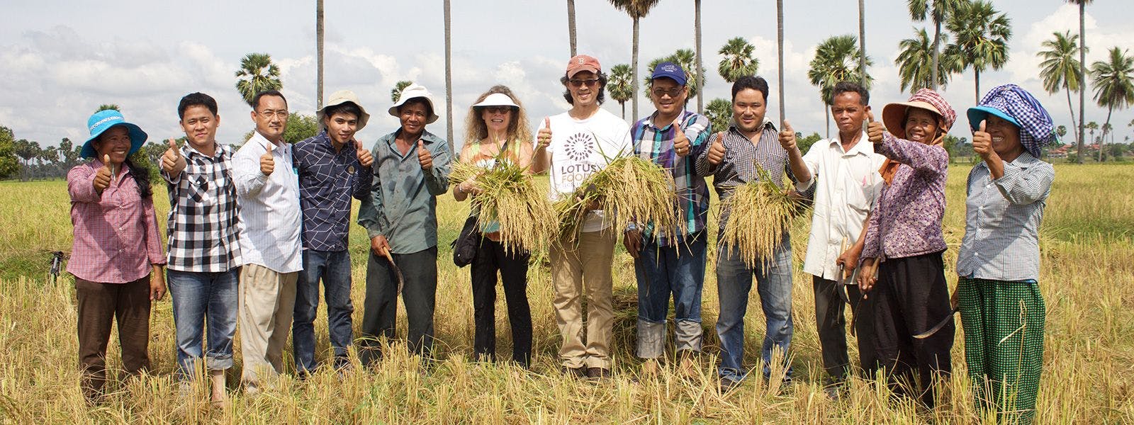 Ken Lee of Lotus Foods with farmers in Cambodia.