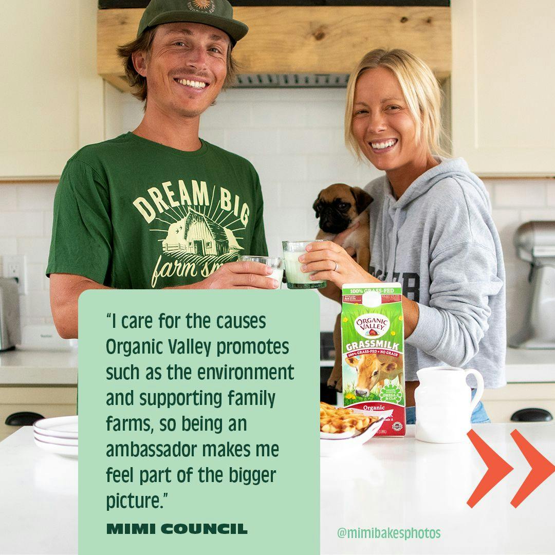 Mimi Council standing with a cup of Organic Valley Grassmilk.