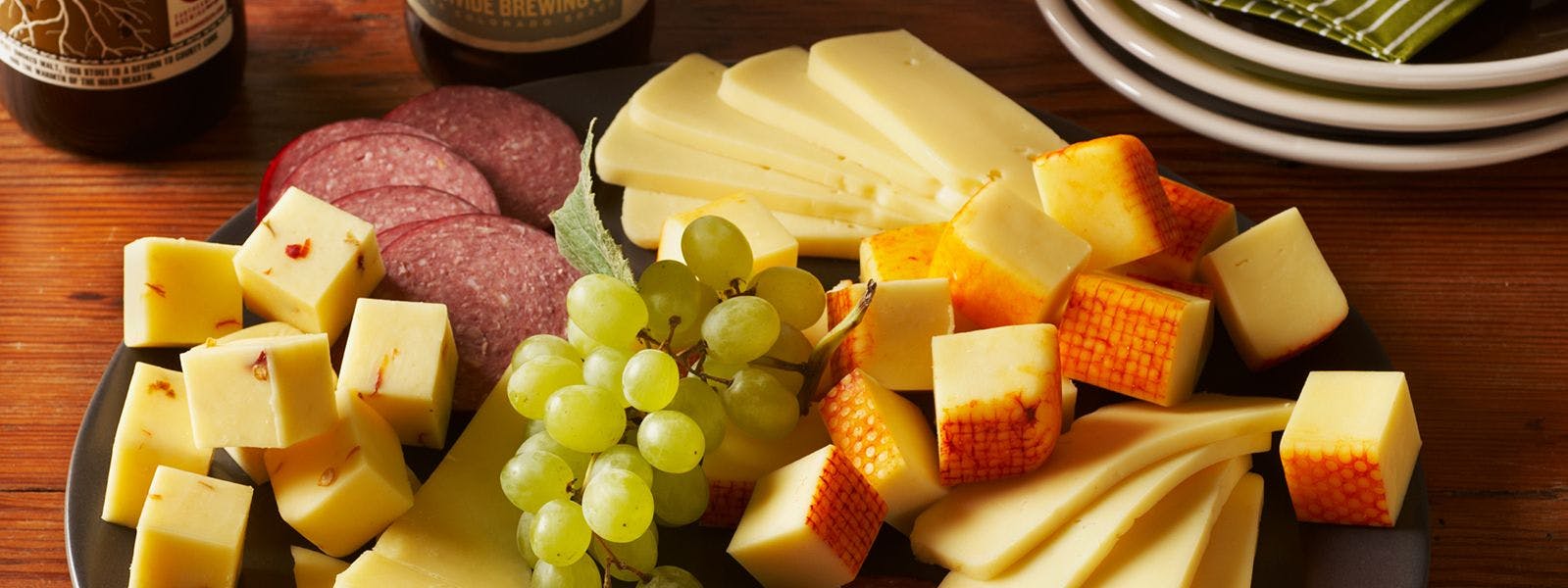 Organic Valley cheese tray with summer sausage and grapes