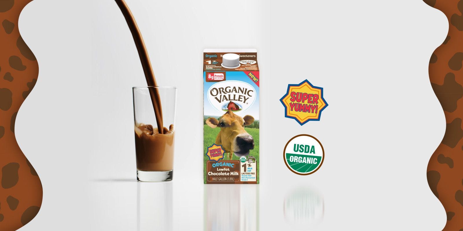 Chocolate milk being poured into a glass next to the Organic Valley 1 percent chocolate milk carton and two icons that say super yummy and USDA organic.
